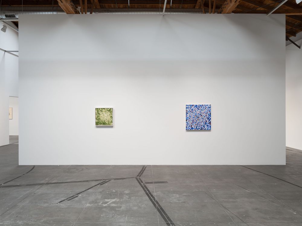 Confirmation and Dexter! (For D.G.), both from 1990, are the only two works on a freestanding wall. Image Credit: Installation view, Jack Whitten: The Numinous, Hauser & Wirth Downtown Los Angeles, 2026–27. Photo: Roger Edwards.