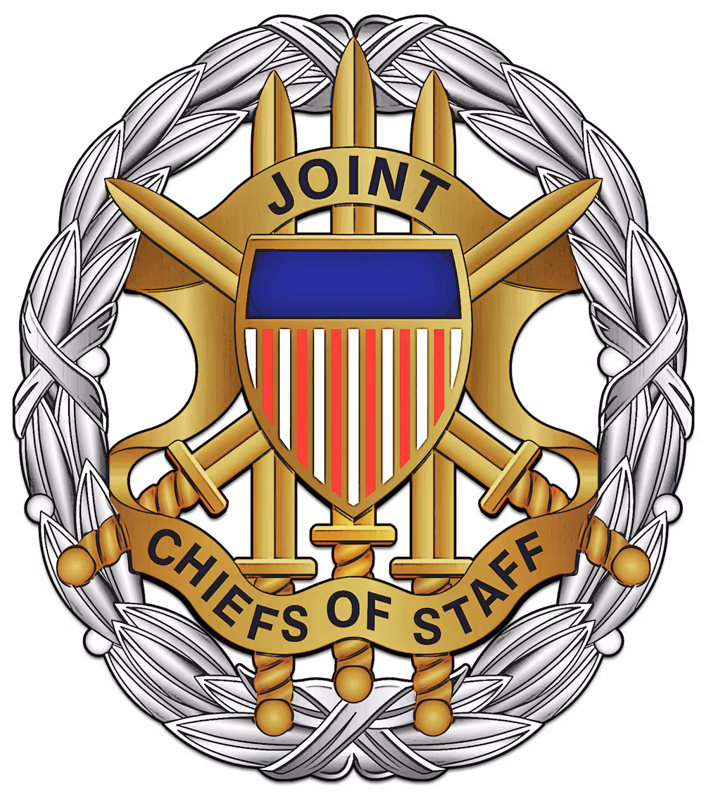 Emblem with five crossed golden swords and a shield featuring a blue top and red and white vertical stripes, surrounded by a silver laurel wreath and a banner reading 'JOINT CHIEFS OF STAFF'.
