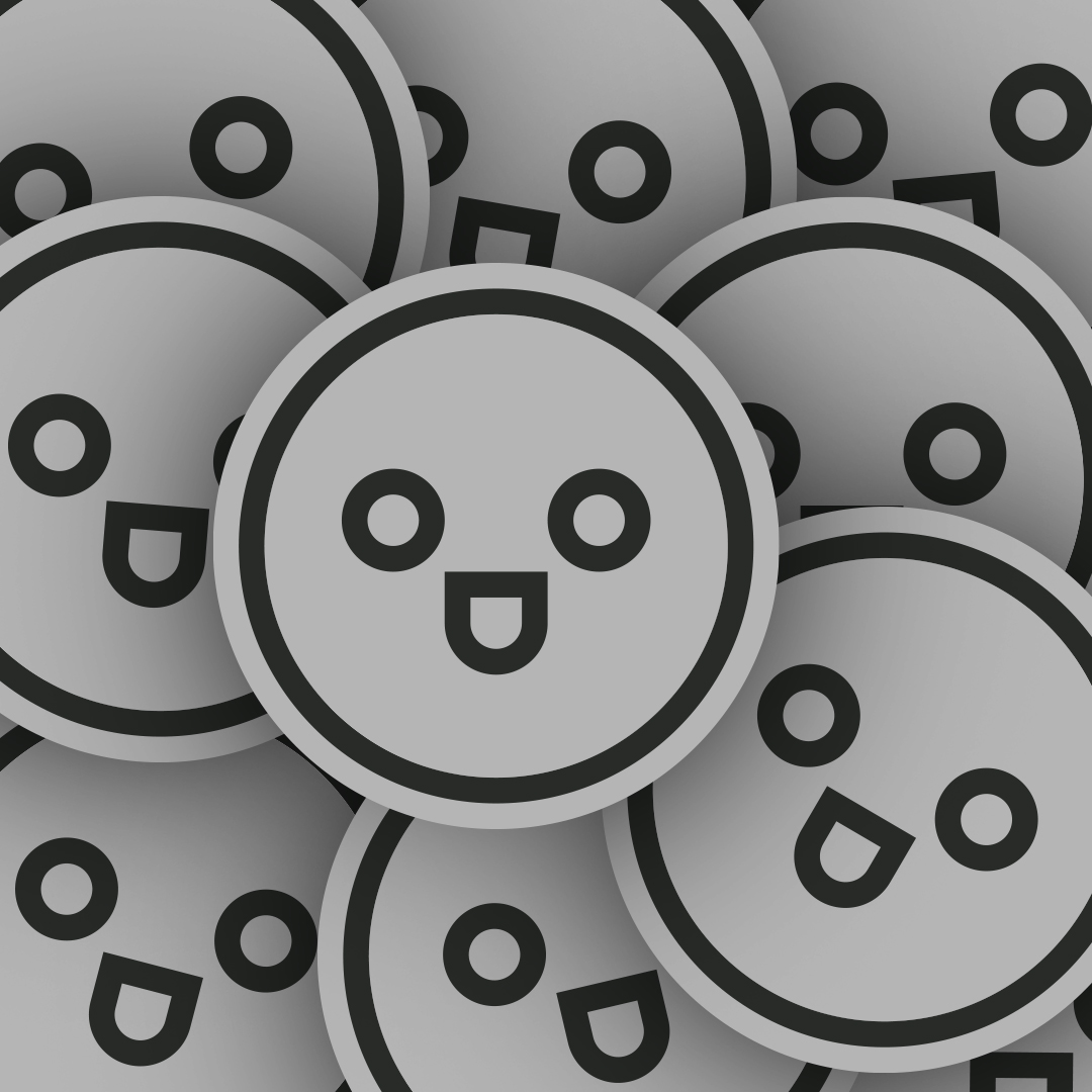 A stack of smiling ODO-character stickers, bringing the brand’s friendly personality to life.