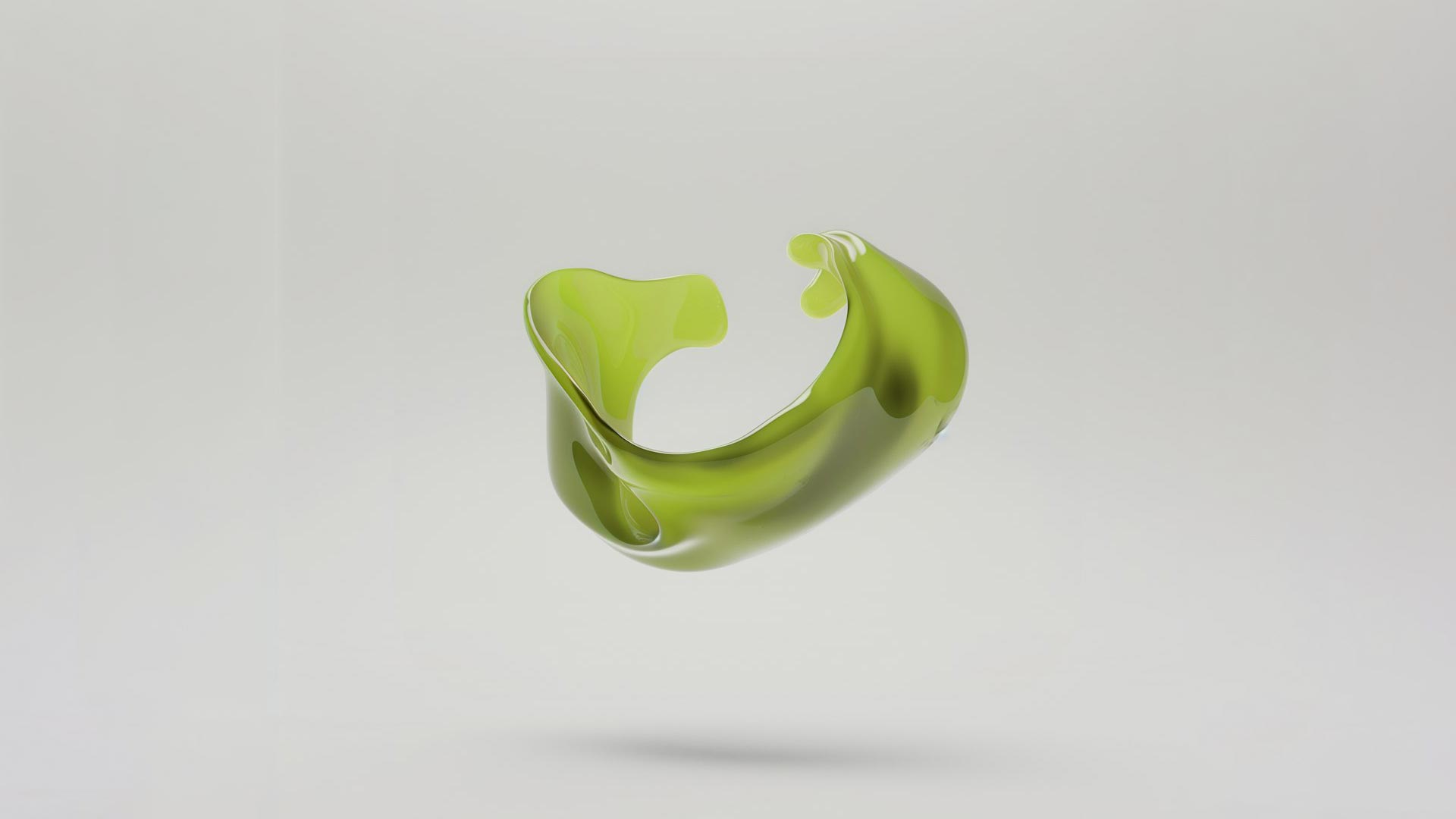 Green splash on gray background.