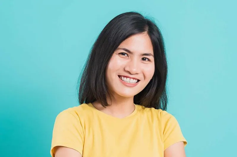 A woman with a smile on her face.