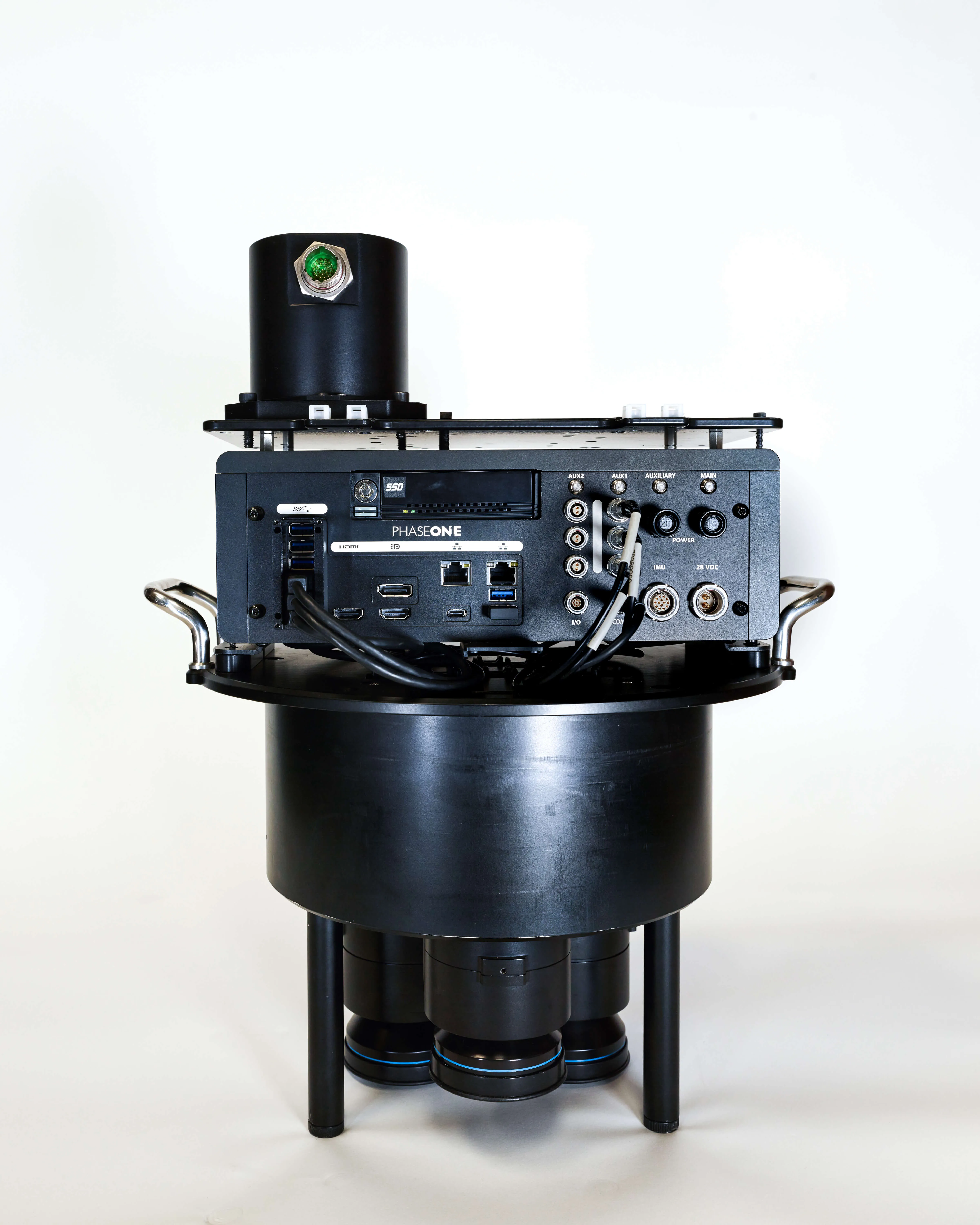 Phase One industrial camera system with multiple lens attachments and various input/output ports on a white background.