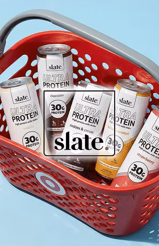 Red shopping basket filled with cans of Slate Ultra Protein high protein milk shakes in flavors vanilla, chocolate, cookies & cream, salted caramel, and strawberry.