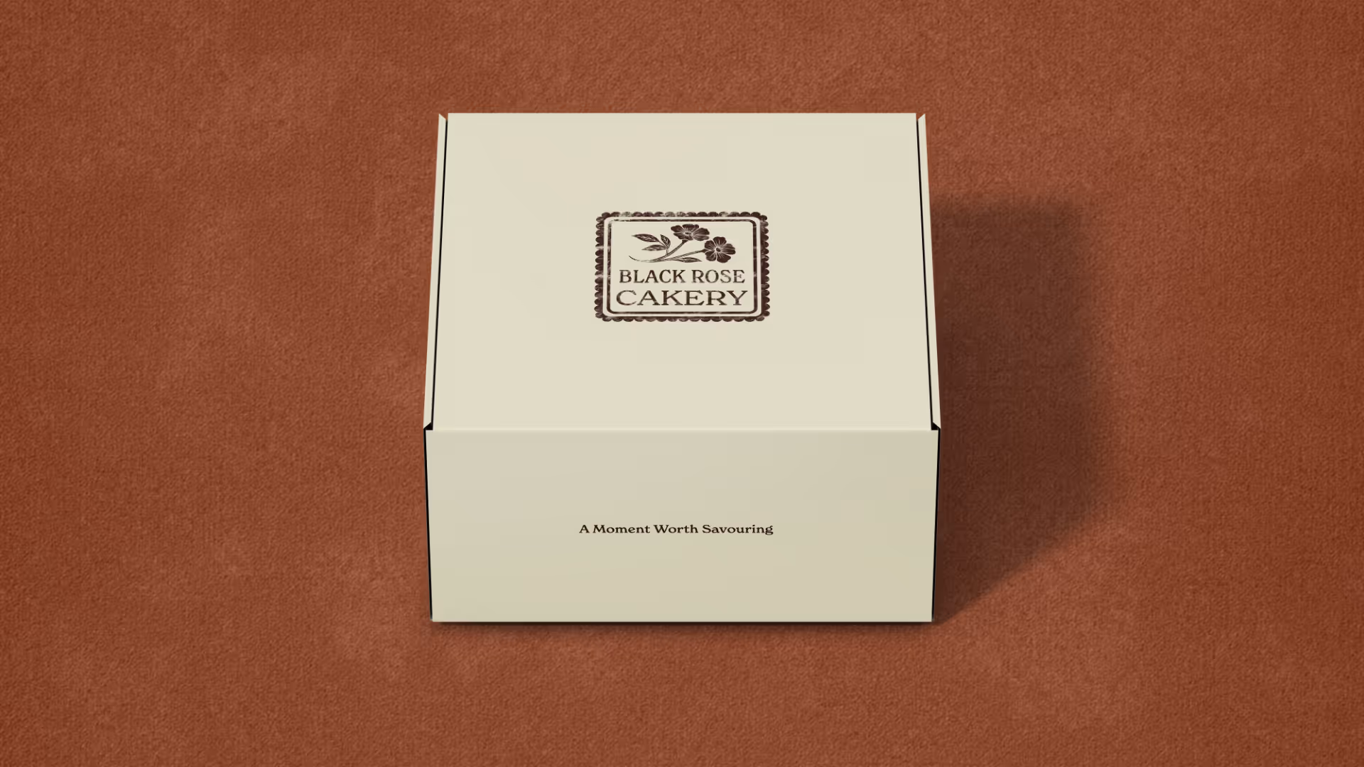 A cake box on a brown background