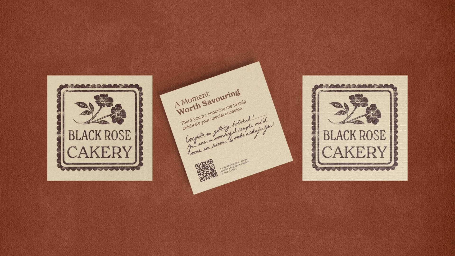 Two Black Rose Cakery logos flanking a tilted note card that thanks a customer and includes a handwritten congratulatory message and a QR code.
