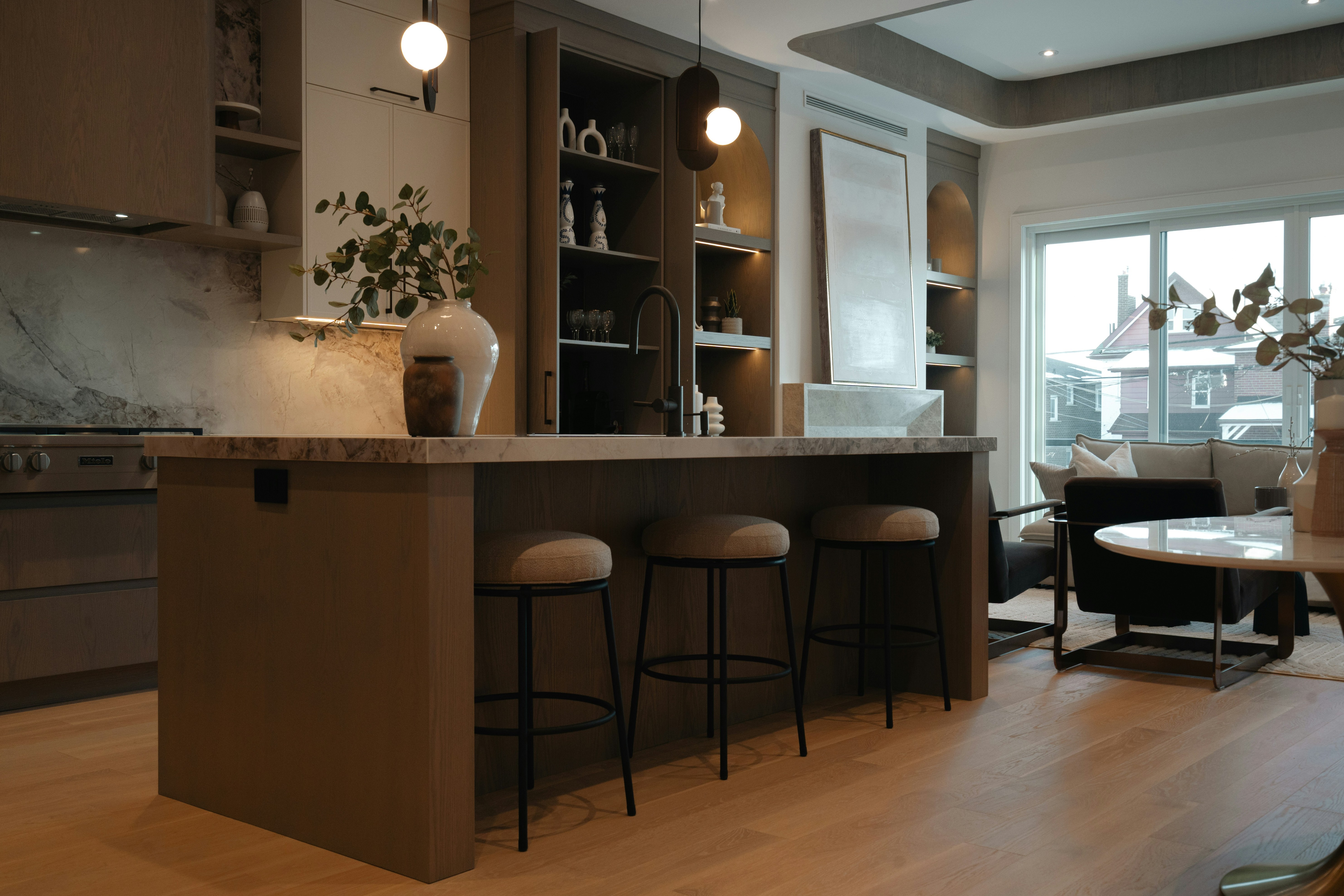 Dark wood kitchen with island stools