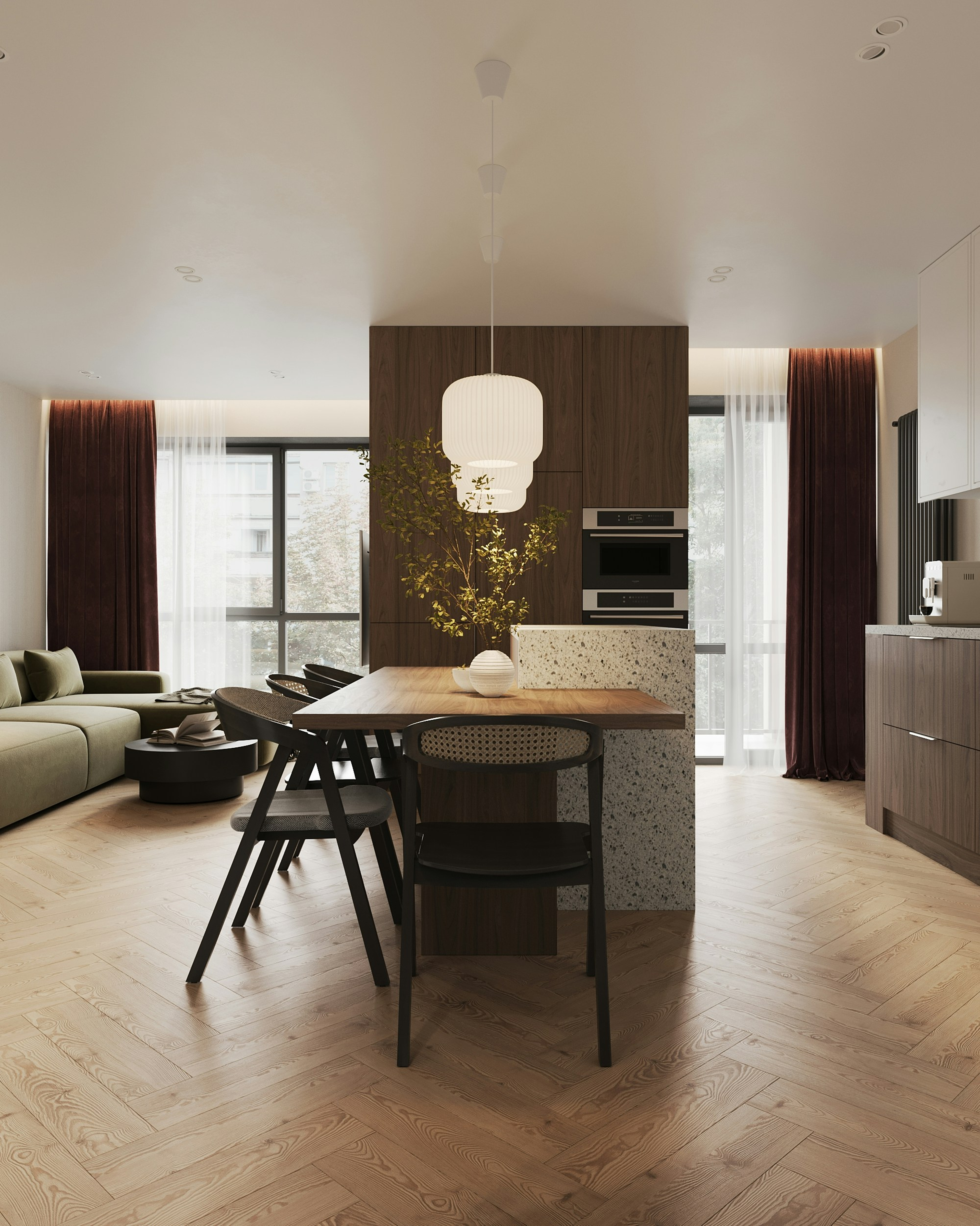 Dining table beside a terrazzo island