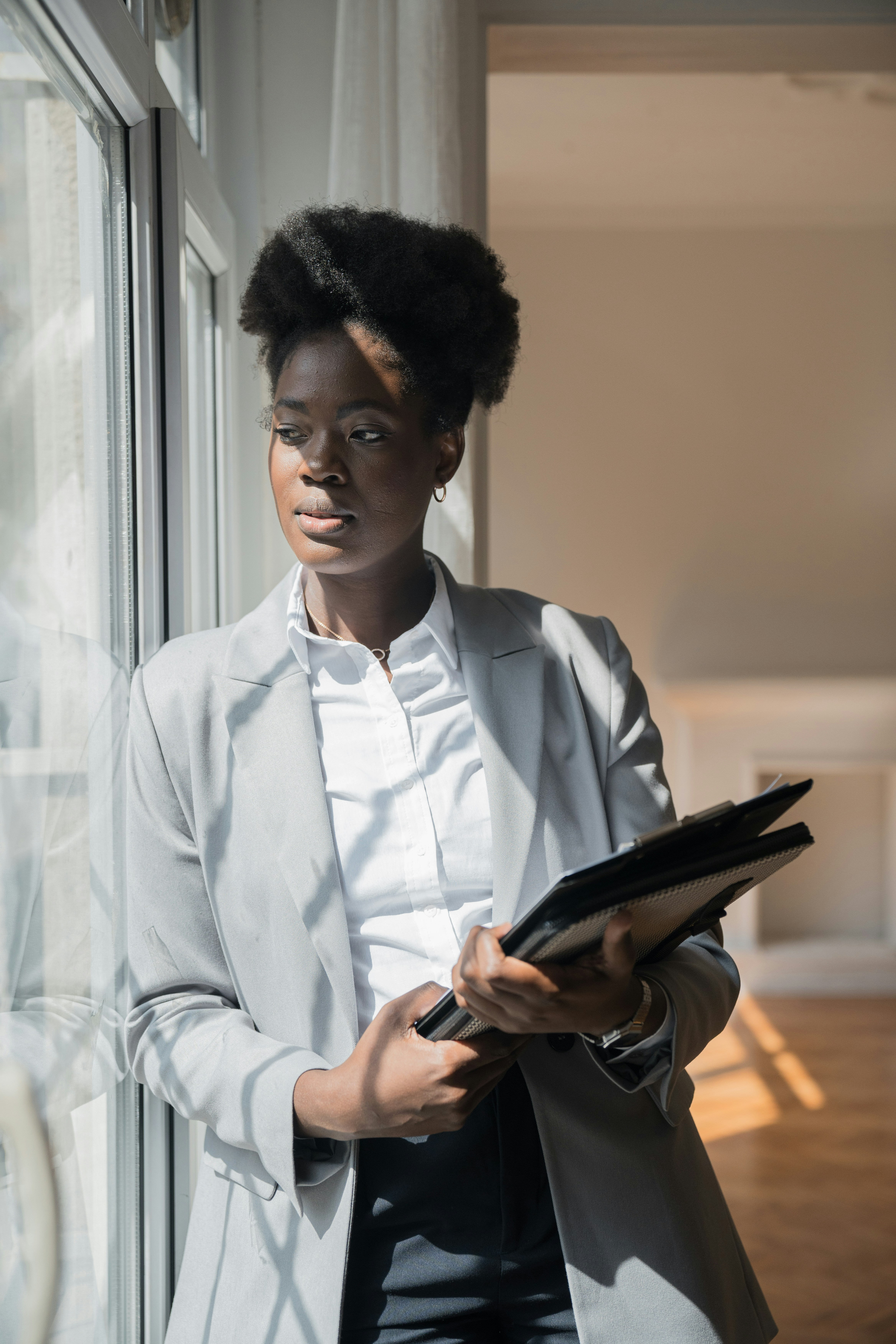 Agent portrait by a sunny window