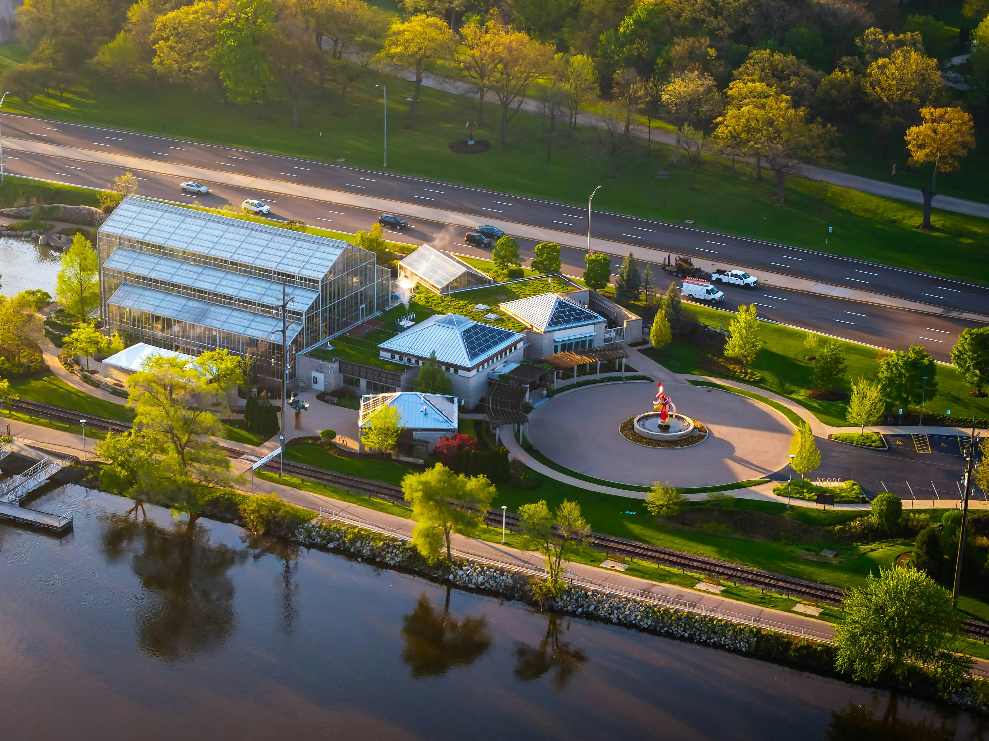 Aerial of a riverside conservatory and gardens