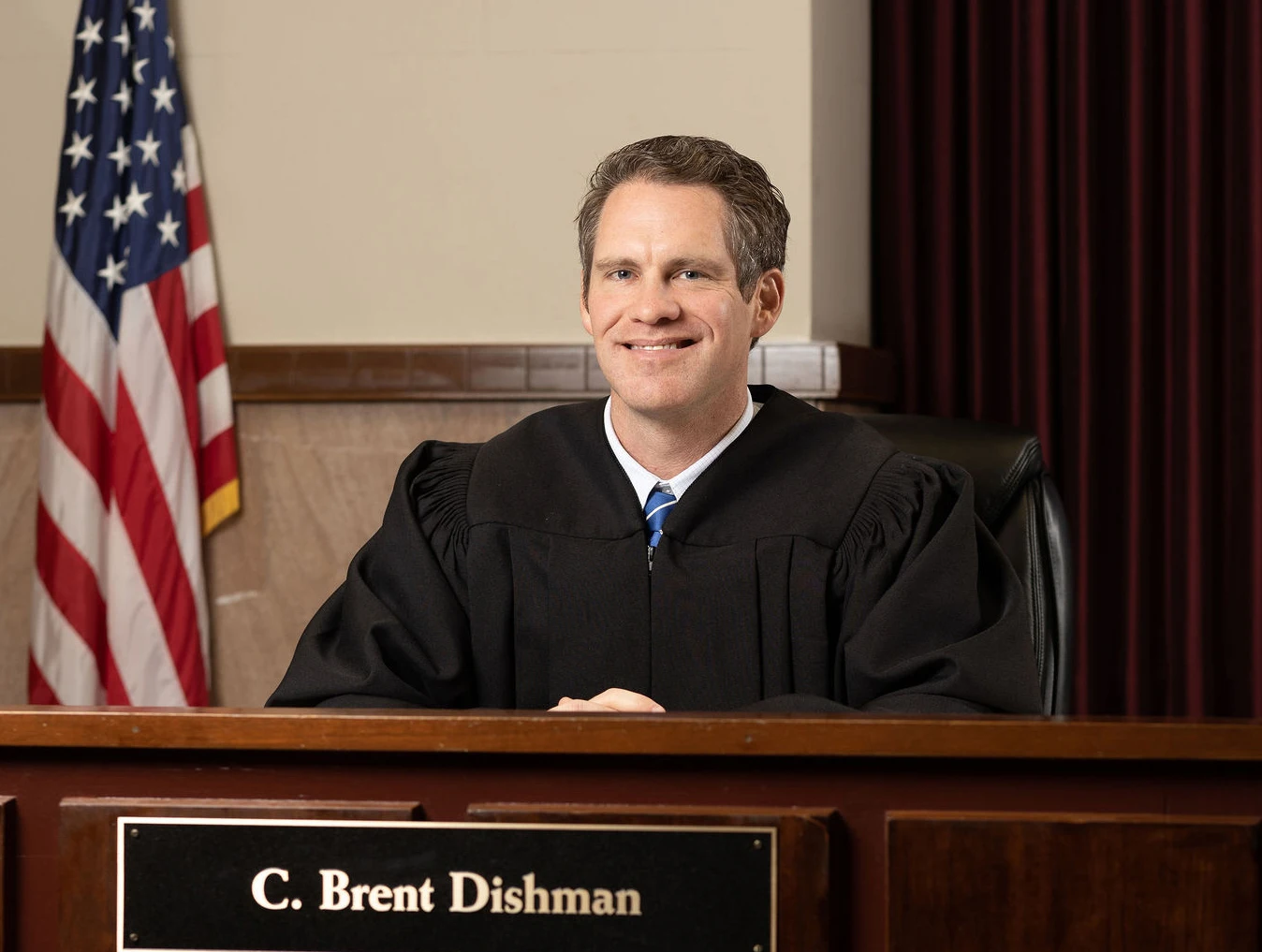 Judge Dishman sitting on the bench in his courtroom at the Oklahoma County Courthouse.