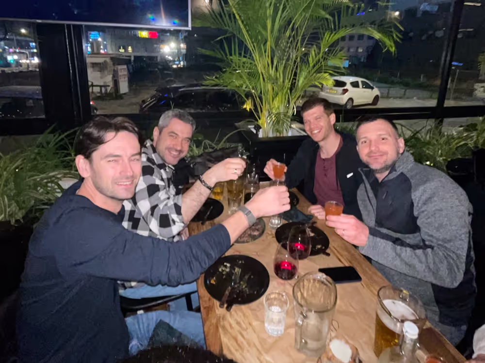 Prime Security team meeting over drinks