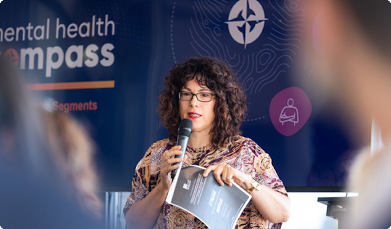 Dr Rebecca Huntley from 89 Degrees East Research presenting the Mental Health Compass