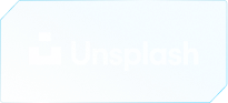 Unsplash logo with white text and icon on a textured blue background.