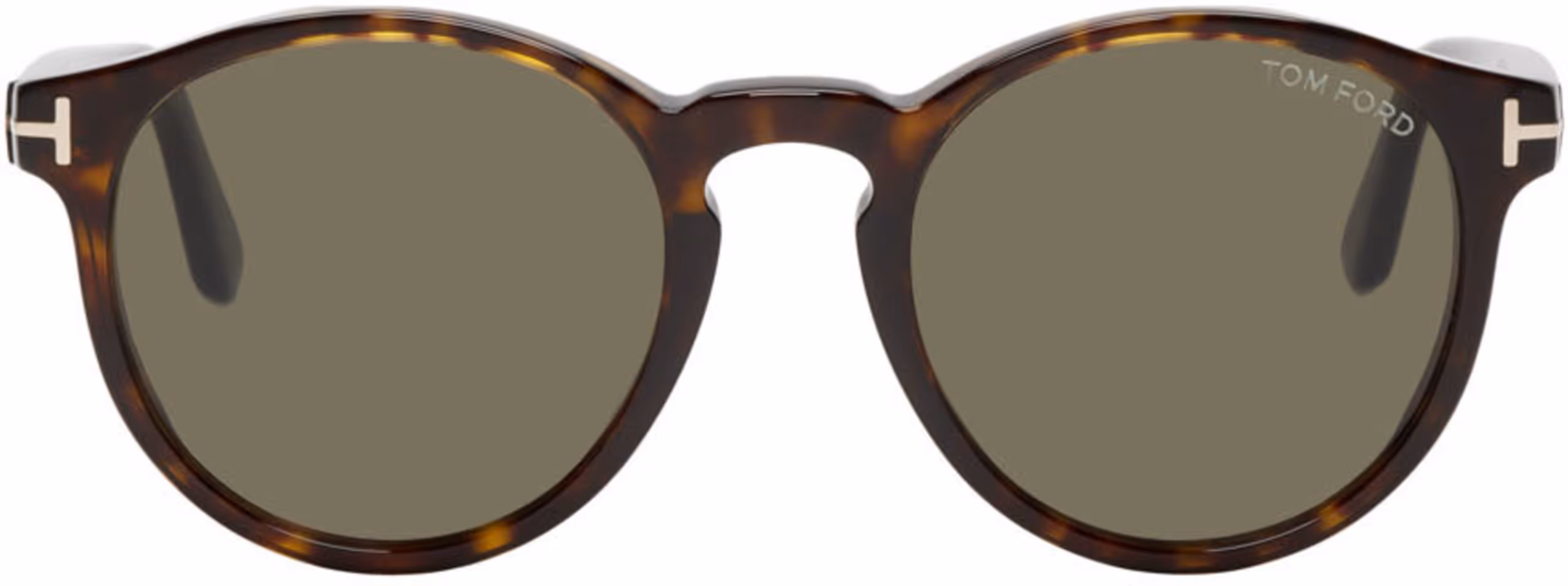 Tortoiseshell round Tom Ford sunglasses with dark lenses and a metallic T logo on the temples.