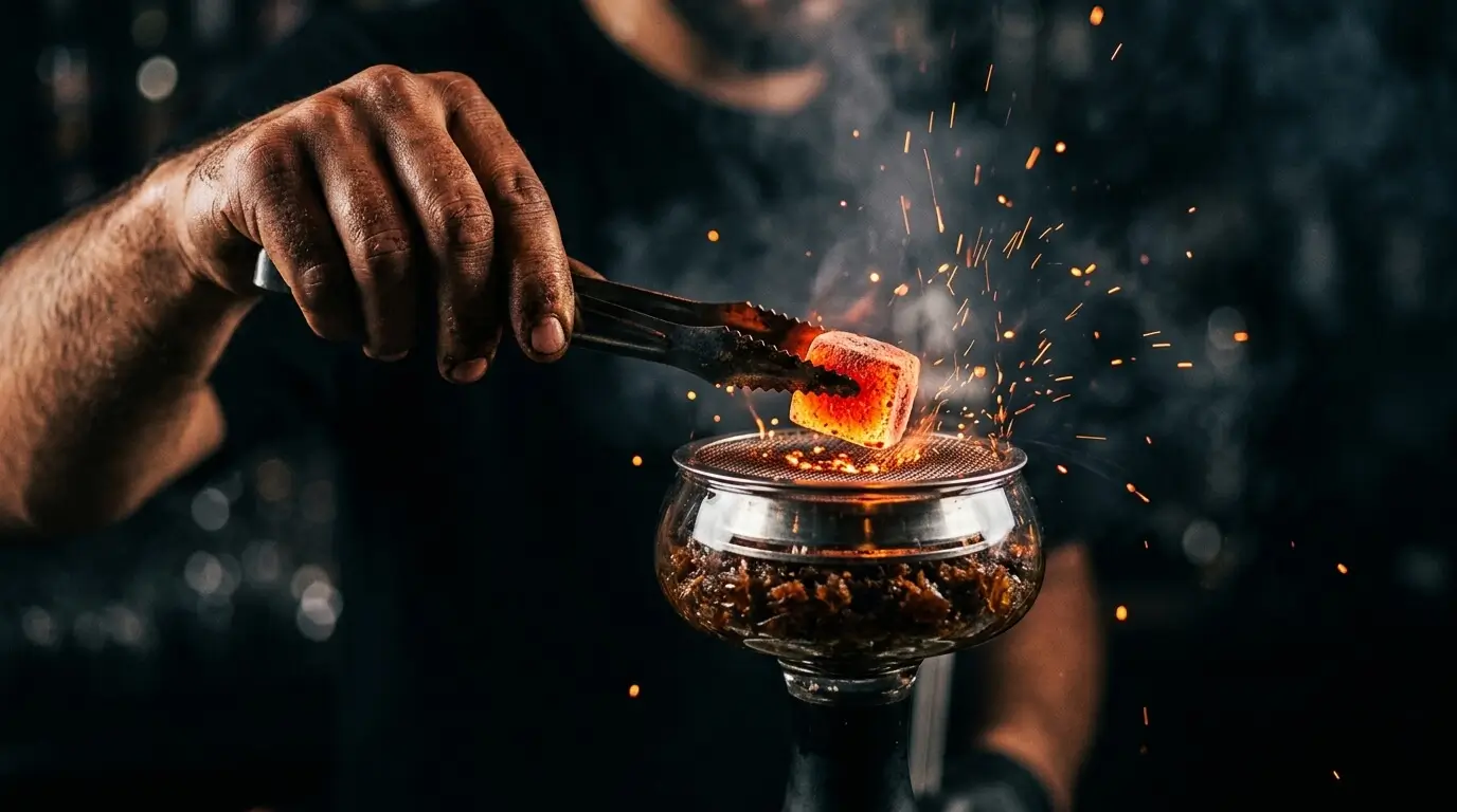 Prompt: Close up of a lounge worker using metal tongs to place glowing red-hot coals onto a modern hookah bowl. Dark background, sparks flying slightly, cinematic high-contrast lighting, highly detailed --ar 16:9