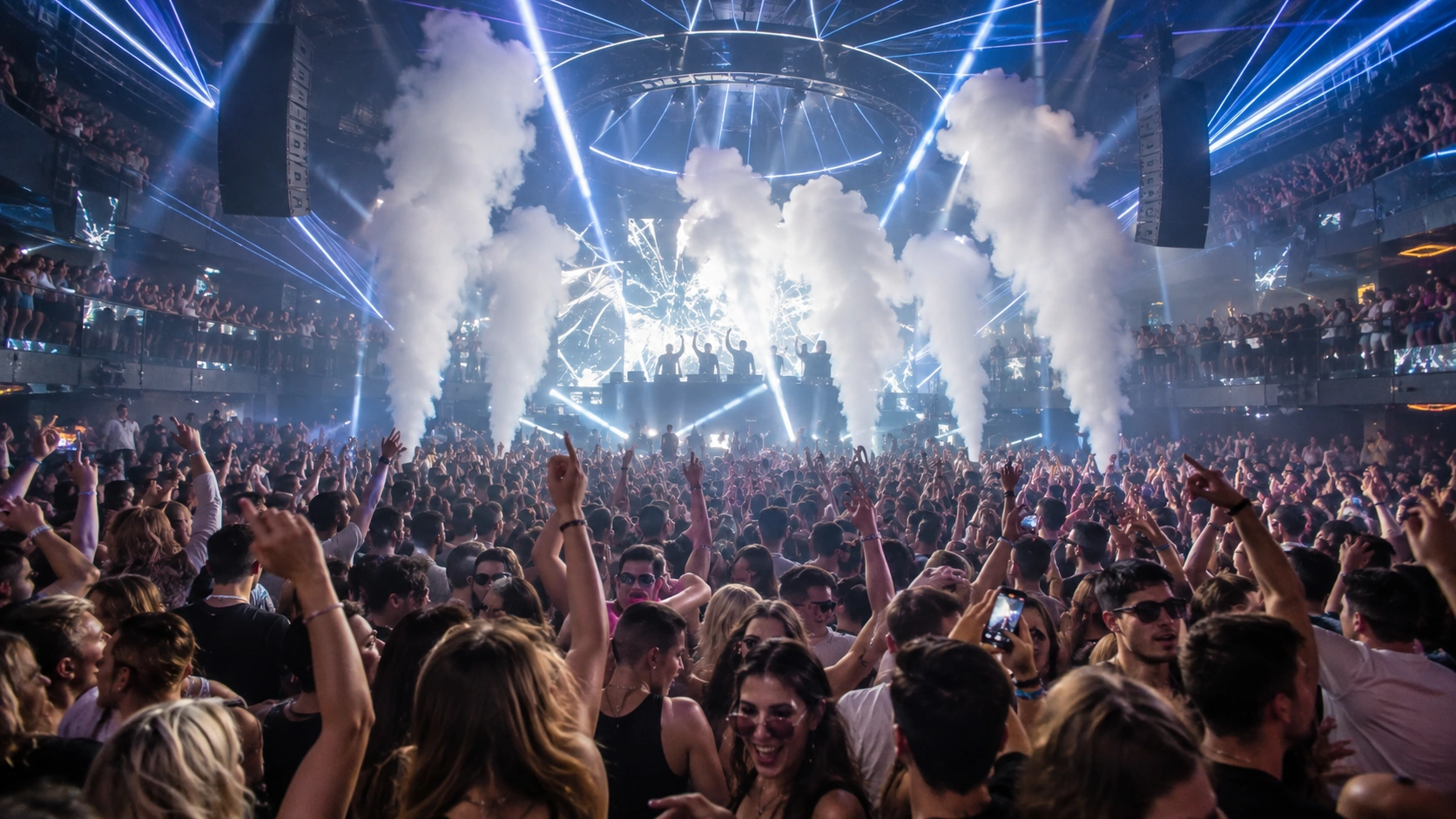 Prompt: High energy Spring Break rave inside a massive Prague mega-club, thousands of students jumping, intense laser light show, CO2 cannons blasting over the dancefloor, realistic nightclub photography --ar 16:9