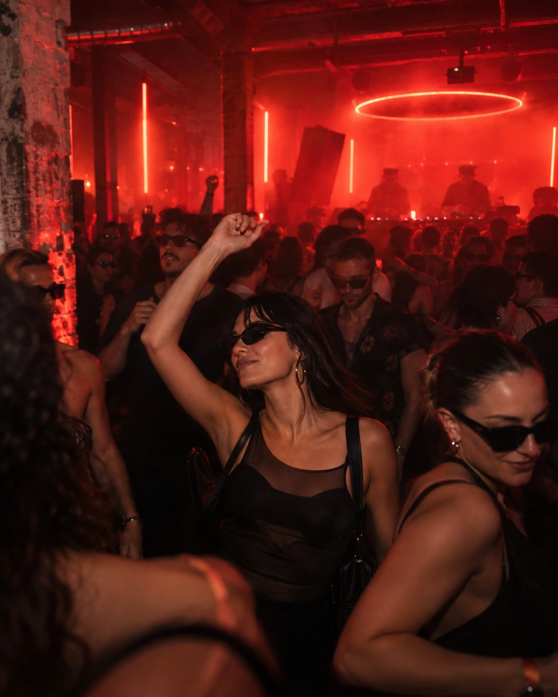 Prompt: A vibrant, hazy afterhours nightclub in Prague at 7:00 AM. Energetic crowd wearing sunglasses indoors, dancing to deep house music under neon red lights. Cinematic nightlife photography, high contrast, underground party aesthetic --ar 4:5