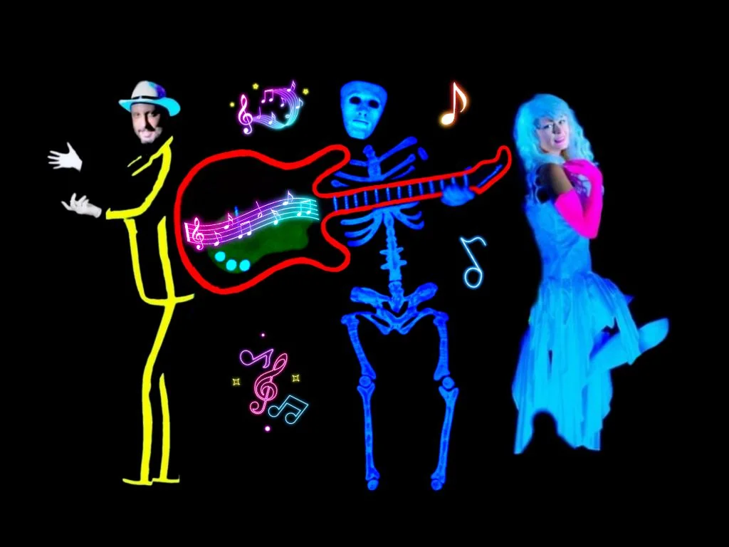 Black-light theatre performance in Prague with illuminated dancers