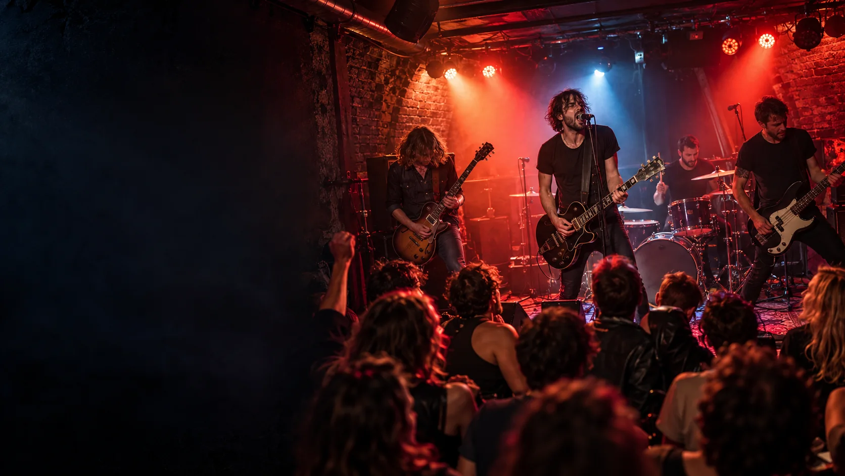 A live rock band performing for a packed crowd in a Prague club