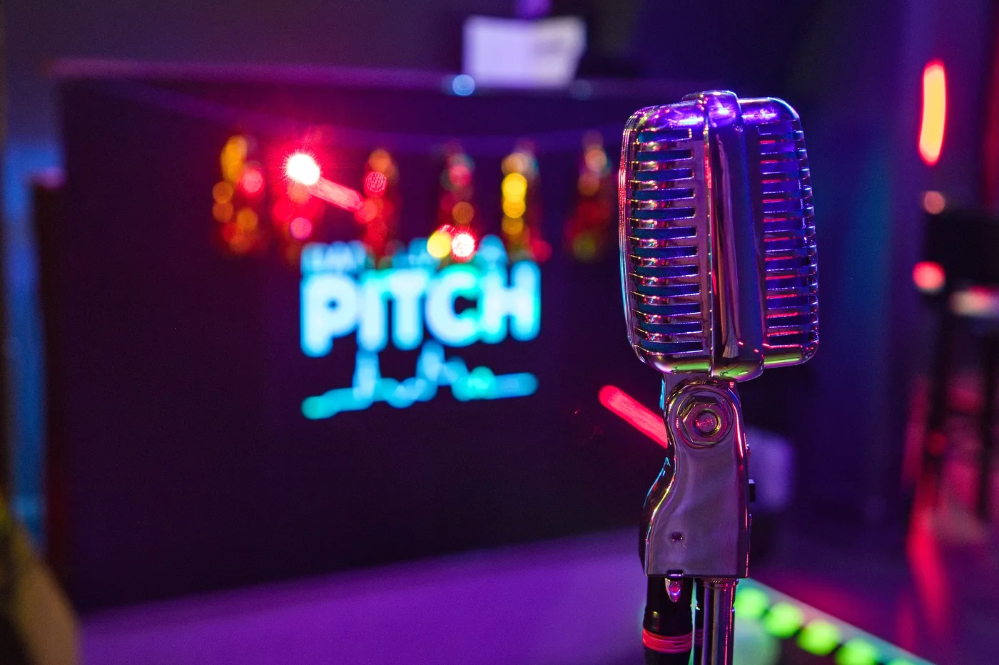 A vintage microphone inside The Pitch Prague