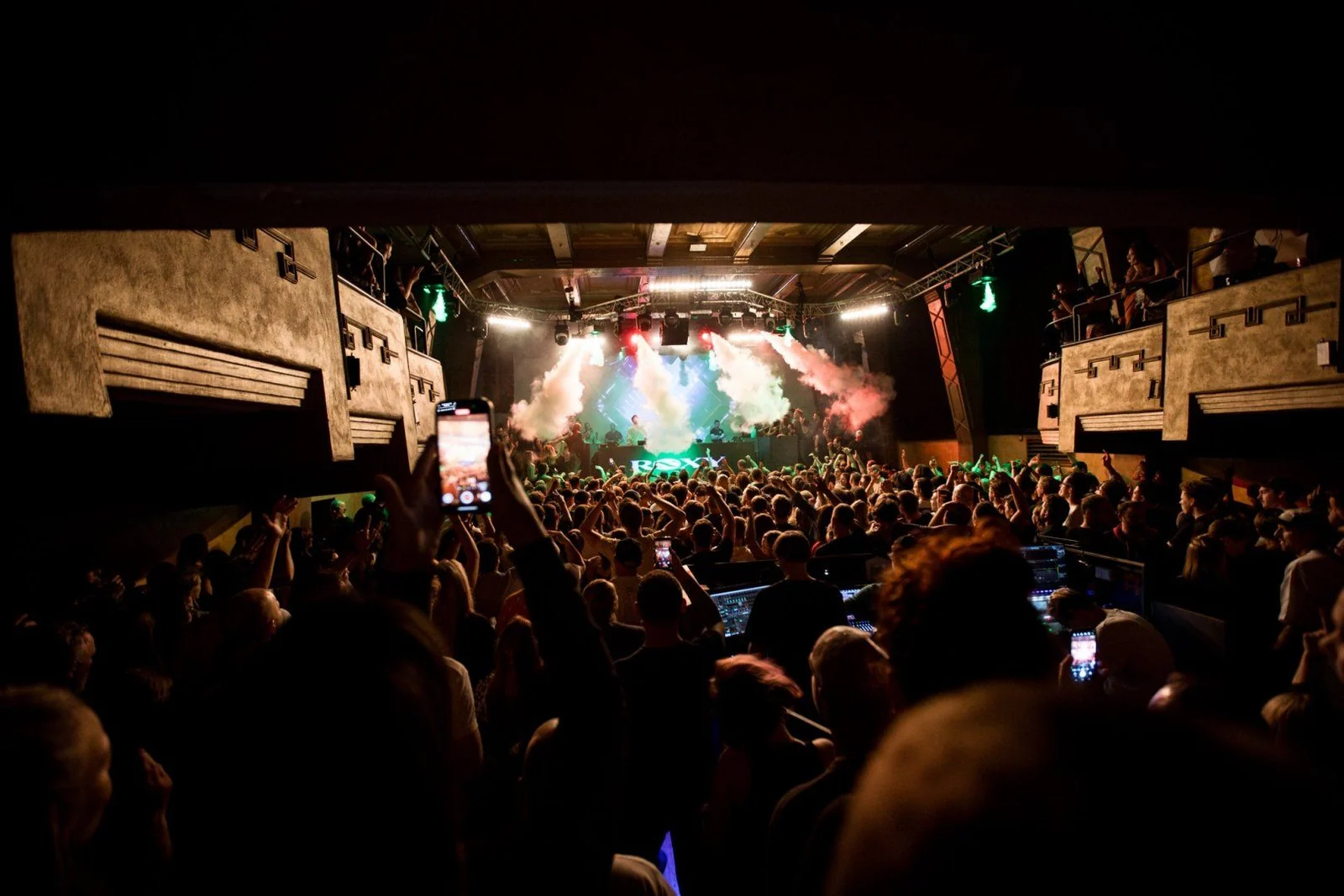 Crowd facing the stage inside ROXY Prague