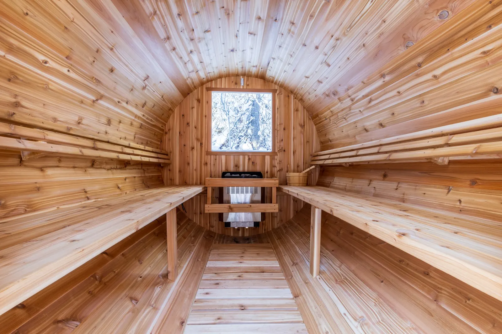 Cedar seating inside the barrel sauna