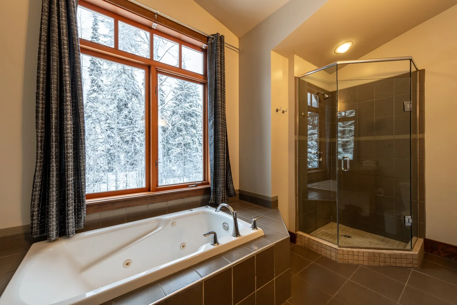 Private Jacuzzi tub in a lodge guestroom bathroom