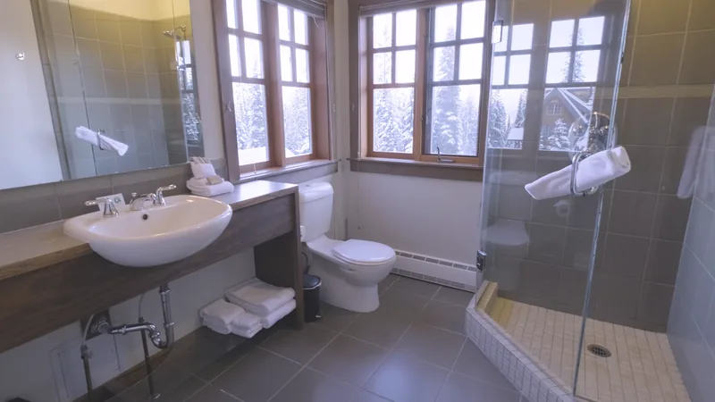 Guest bathroom with vessel sink and glass shower