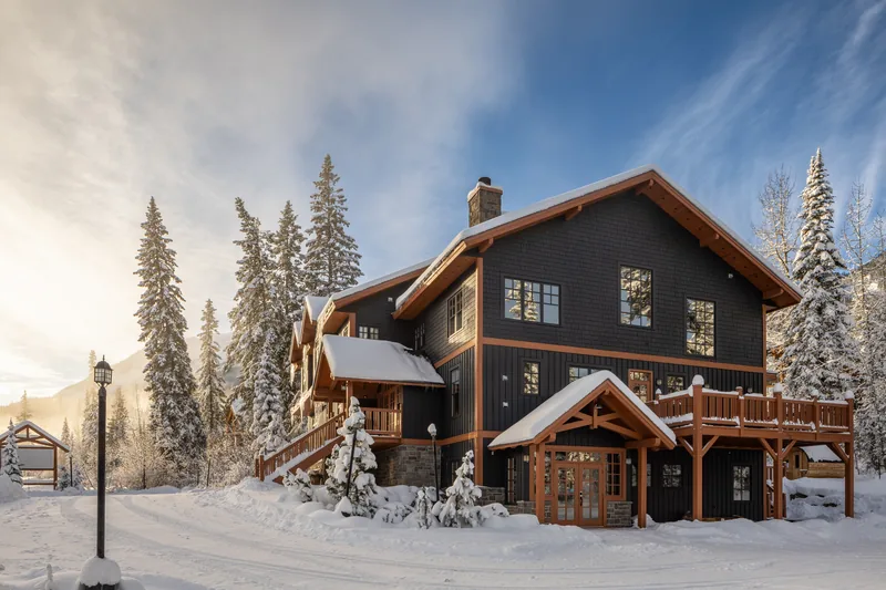 Copper Horse Lodge and snowy trees in warm evening light