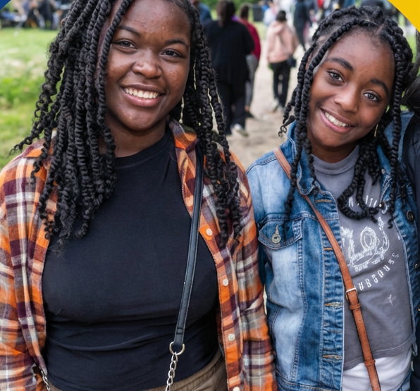 Urban Triage Youth Employment Program graphic featuring two smiling youth outdoors.