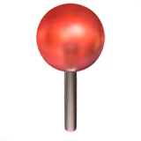 Runder roter Stecker mit silberfarbenem Stift.