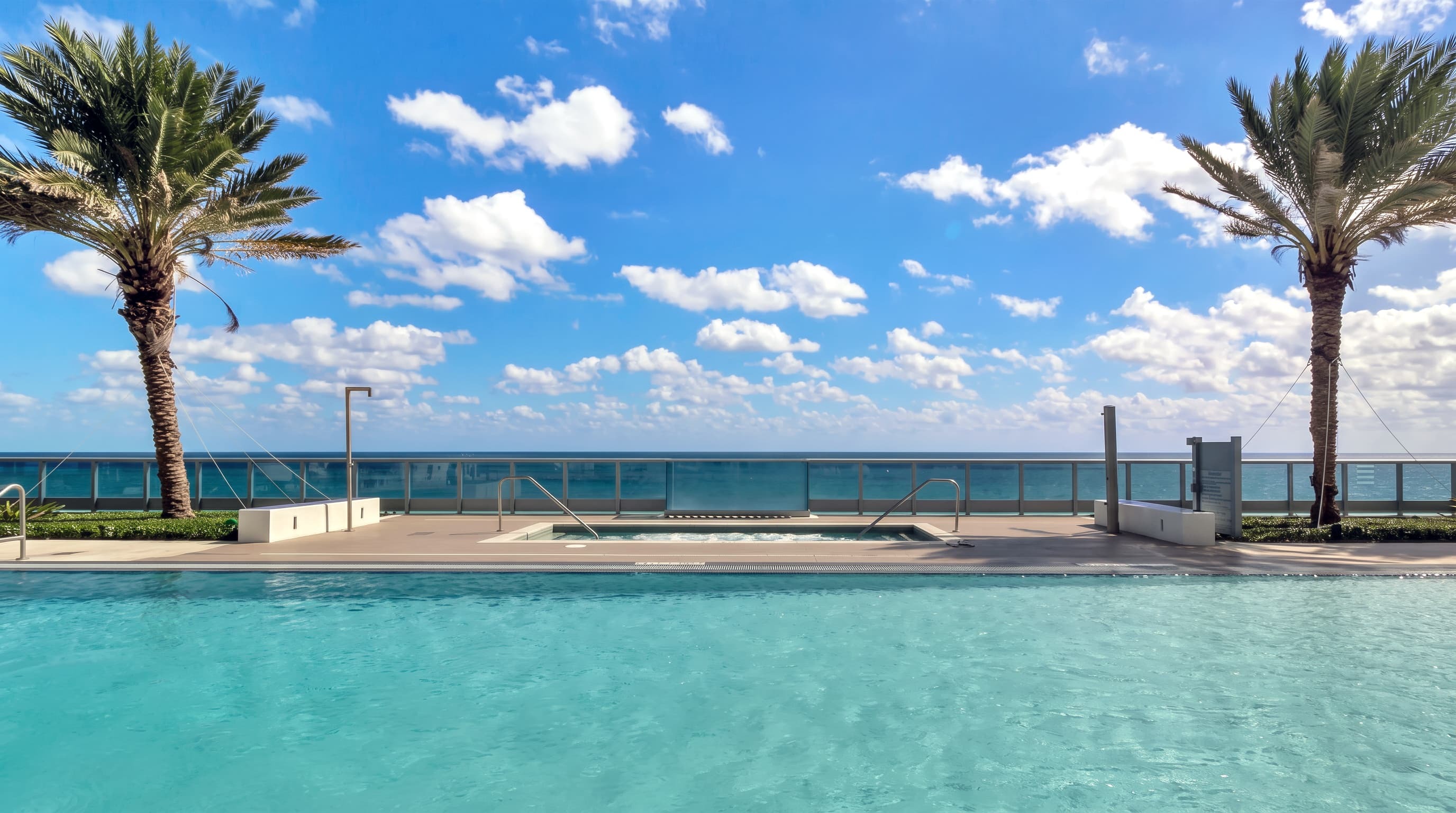 Outdoor pool connected to Miami beach view