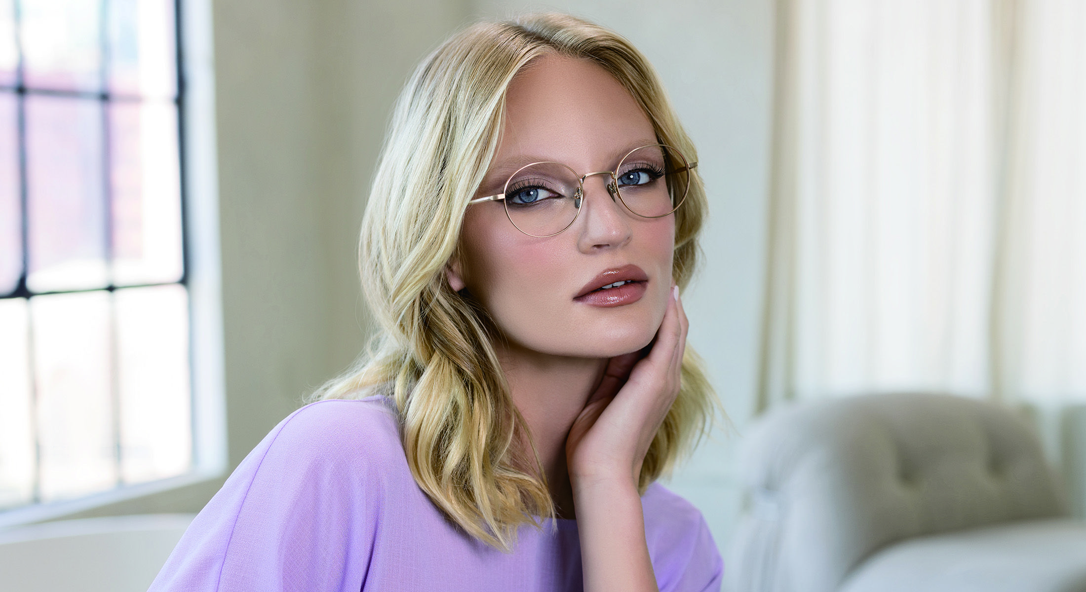 A women wearing Masunaga frames