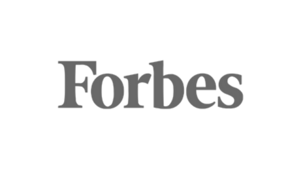 Forbes logo in gray serif font on transparent background.
