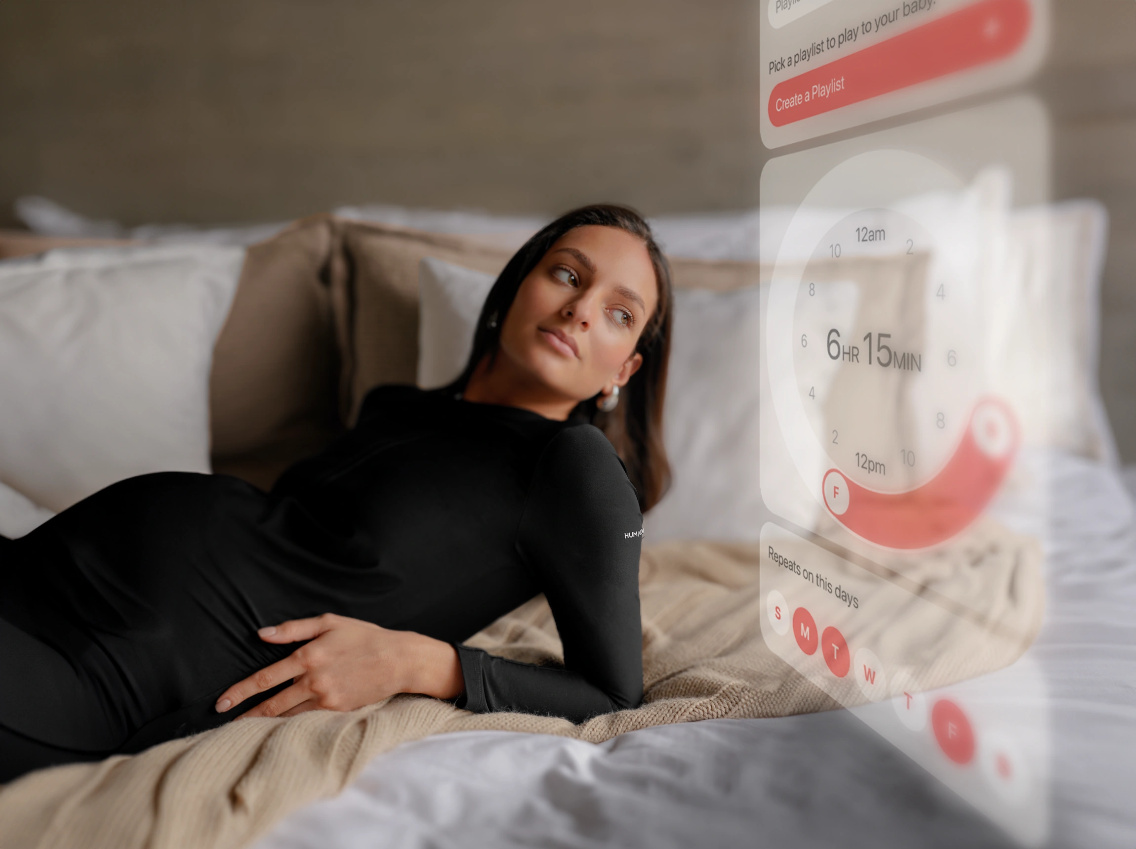 Pregnant woman with HUMAKNITY's app interface