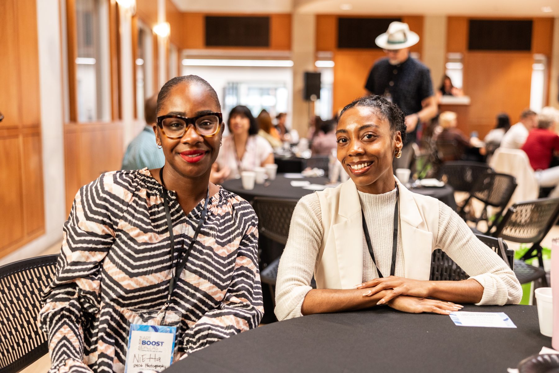 Artists in conversation at a community table