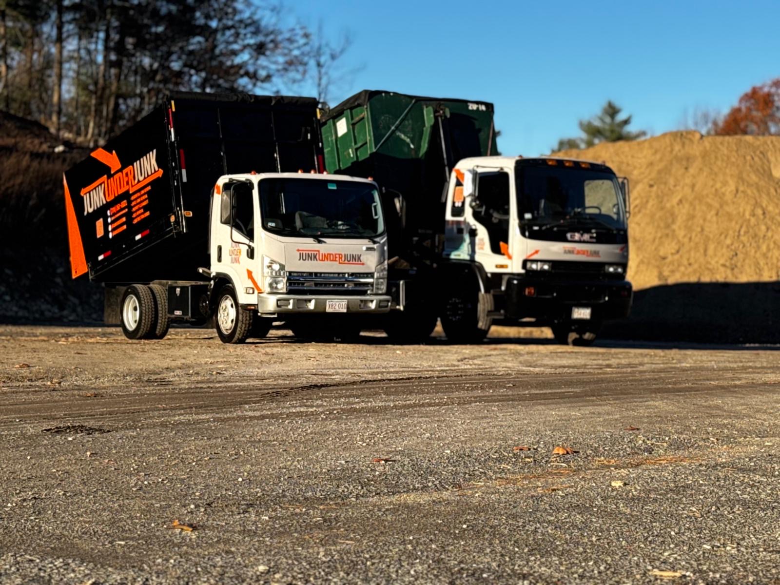 junk removal truck hauling debris from a residential property in Wellesley MA