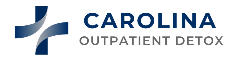 Carolina Outpatient Detox logo with stylized cross in blue and gray
