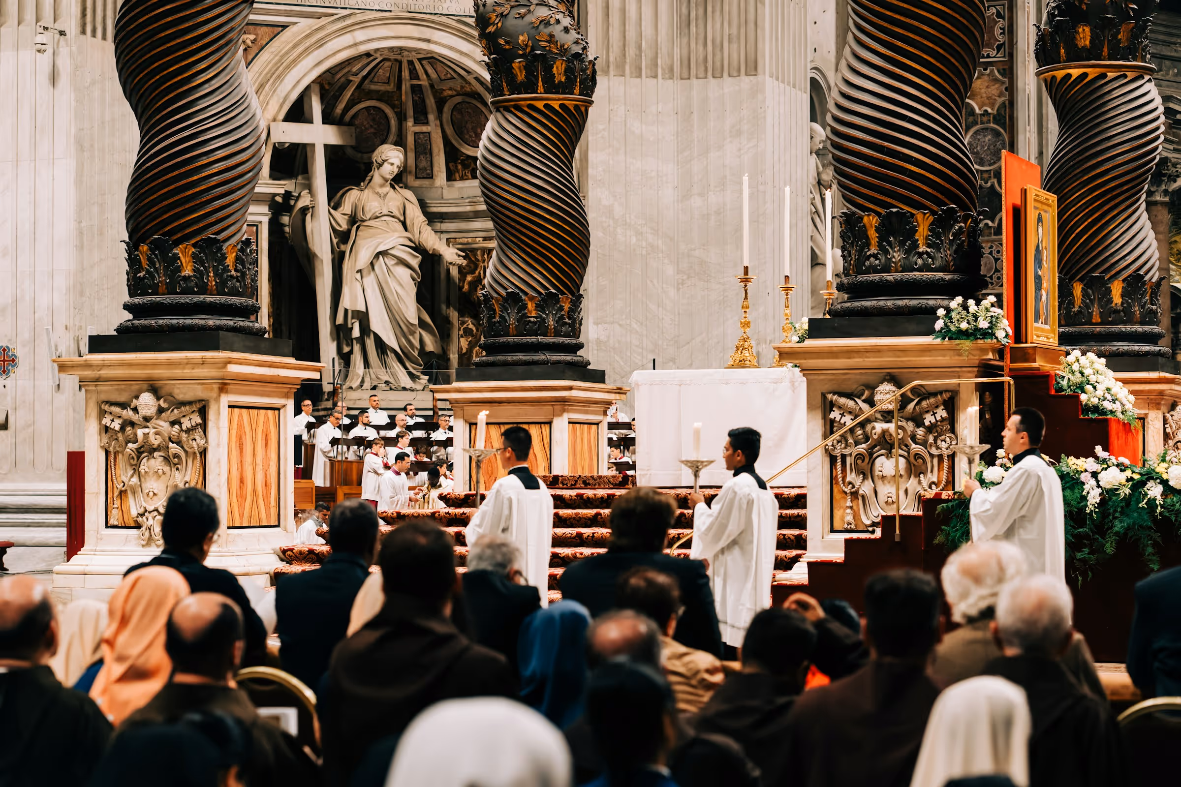 Procession during Mass inside a large, beautiful Catholic church