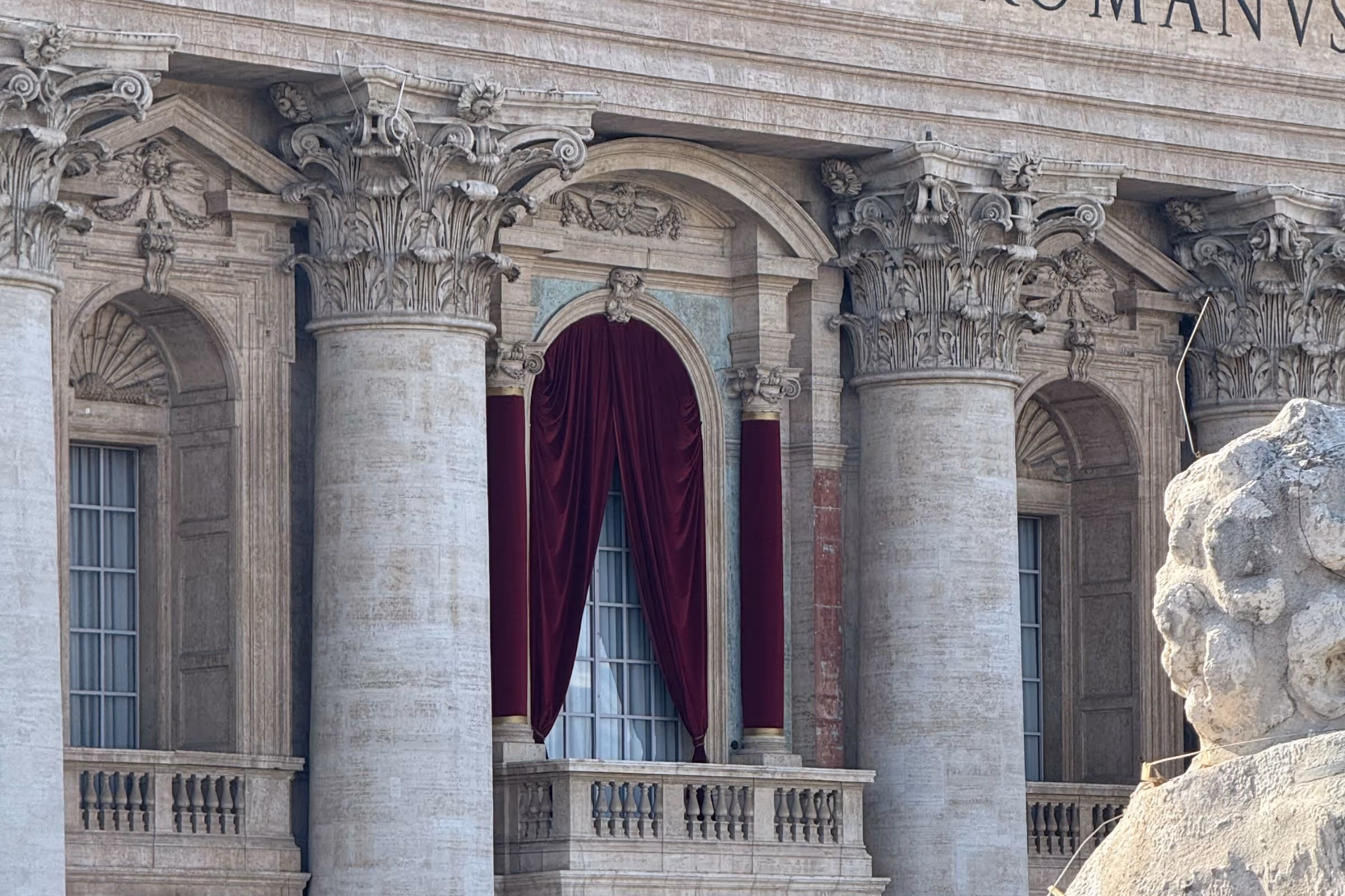 The balcony over the doors of St. Peter's Basilica overlooking the square