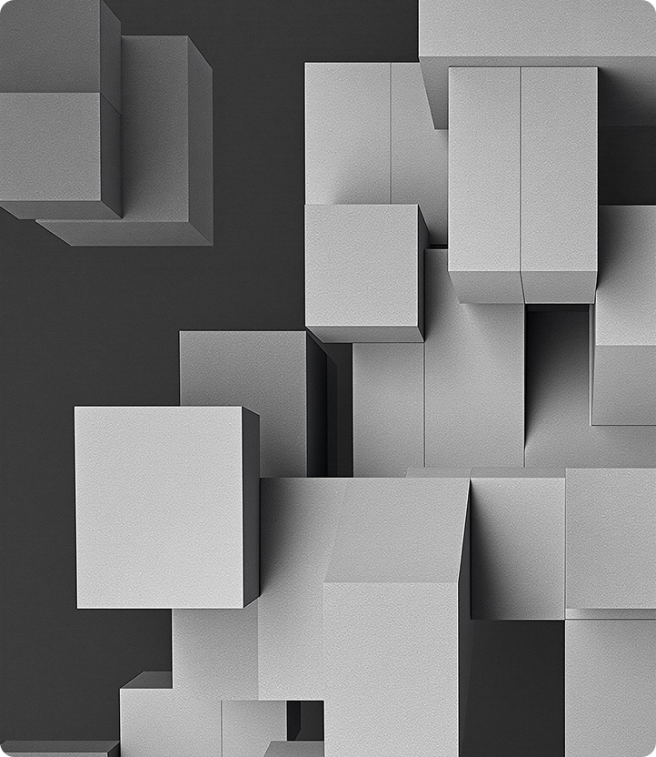 Top-down view of various gray 3D rectangular blocks arranged abstractly on a dark background.
