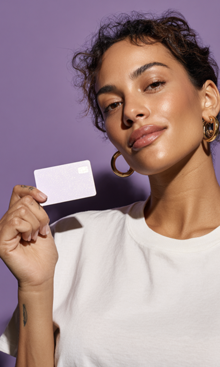 Stylist holding a StyleSeat payment card