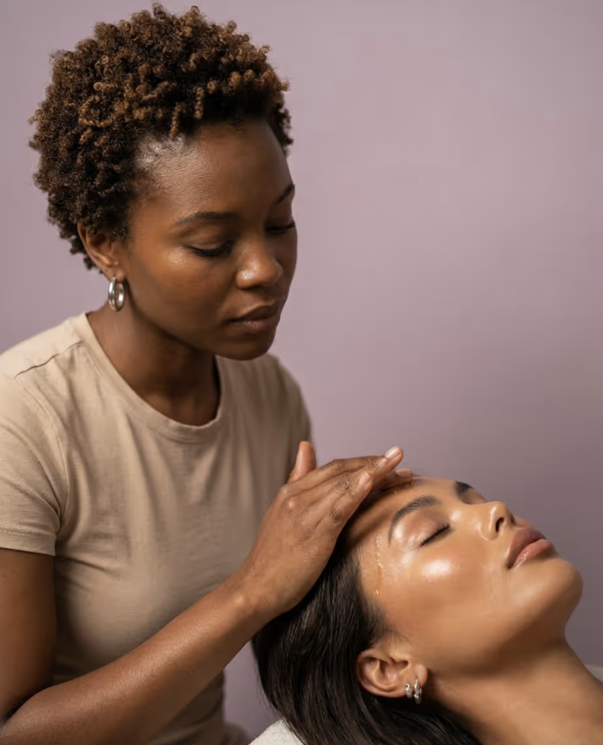 Esthetician performing a facial treatment