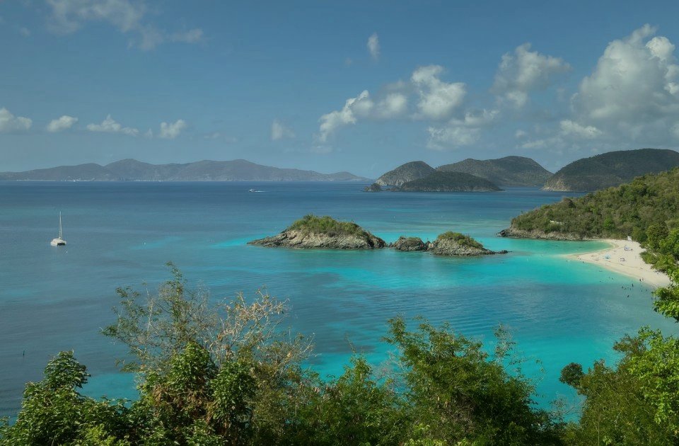 Trunk Bay Beach, St. John USVI, Virgin Islands National Park with undeveloped green hillside backdrop