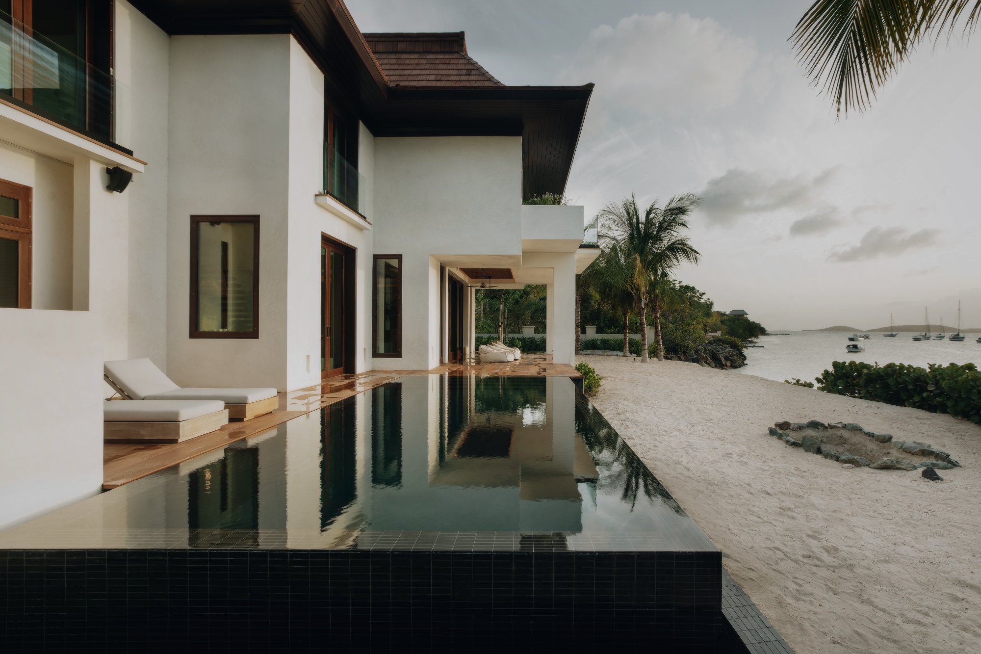 Indo House infinity pool with direct waterfront access, Great Cruz Bay, St. John USVI