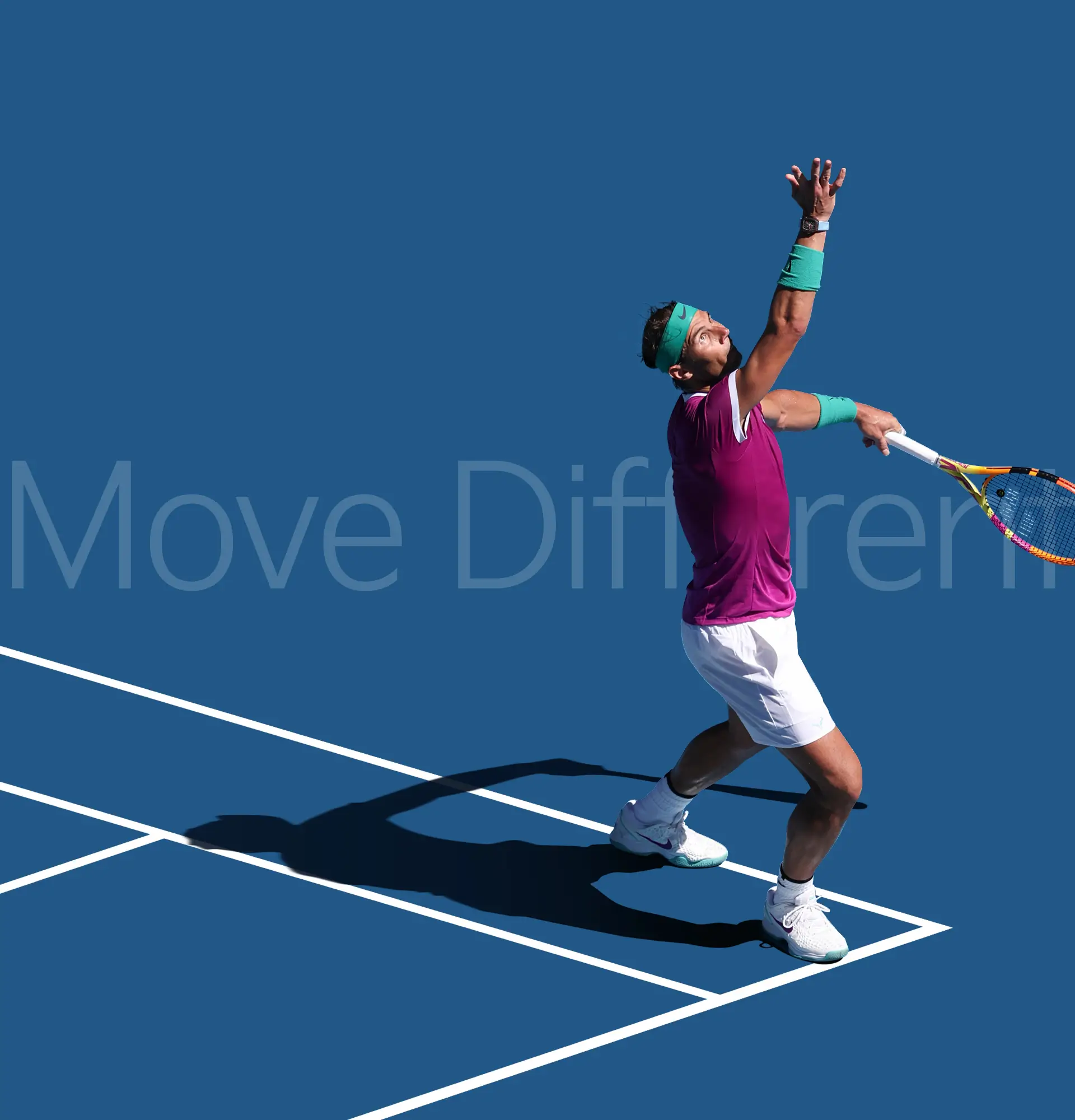 Male tennis player in purple shirt and white shorts preparing to serve on a blue court with white lines.