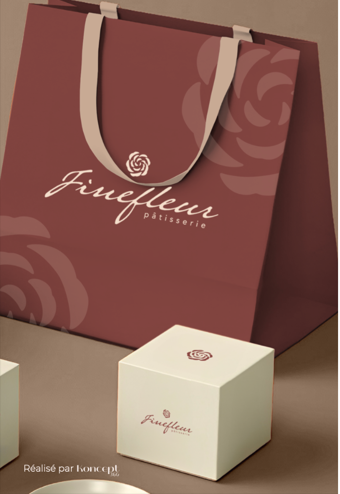 Brown shopping bag and cream-colored box branded with Finefleur pâtisserie logo featuring a stylized flower.