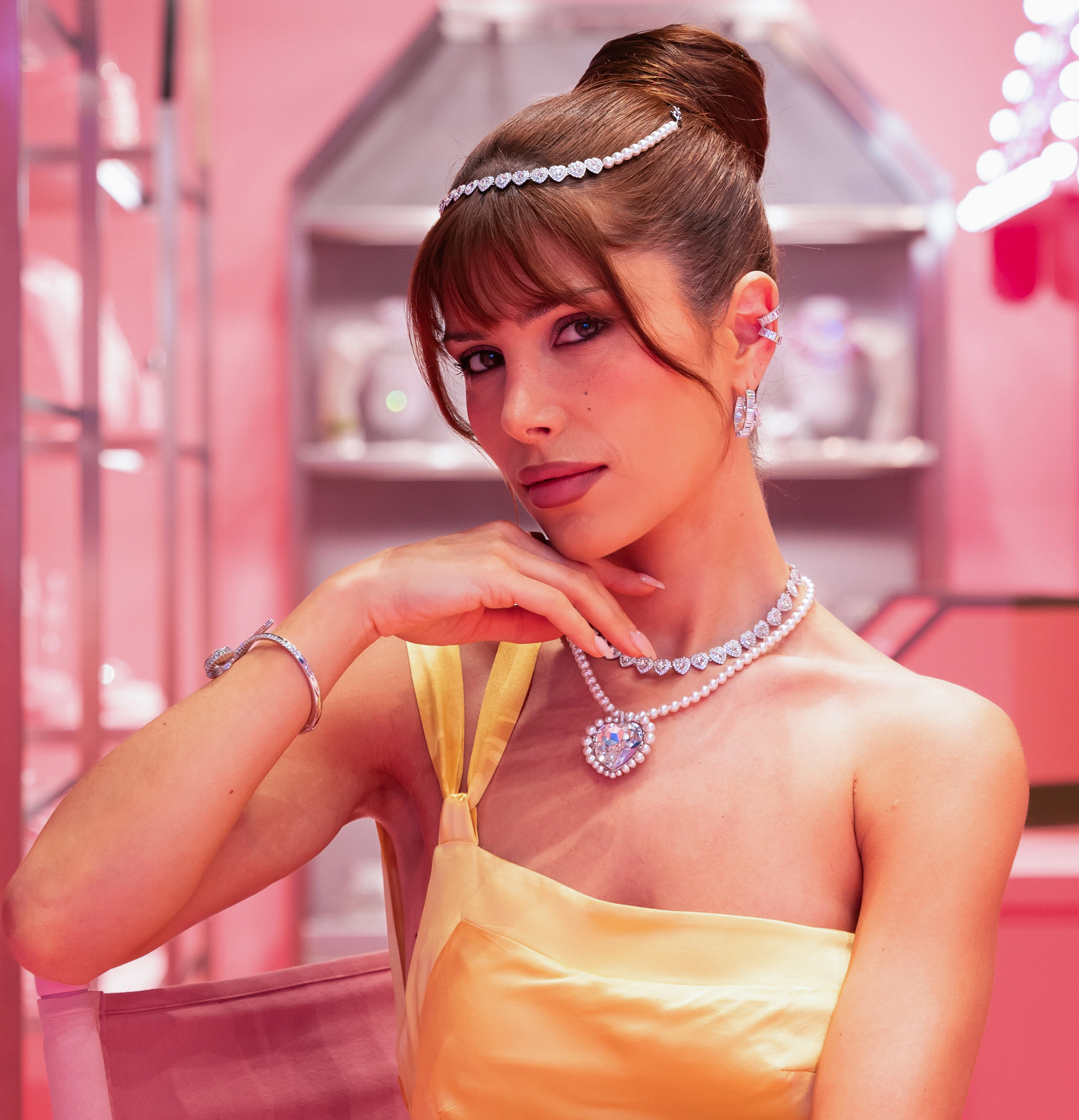 Soft pink-palette portrait for the Swarovski capsule launch