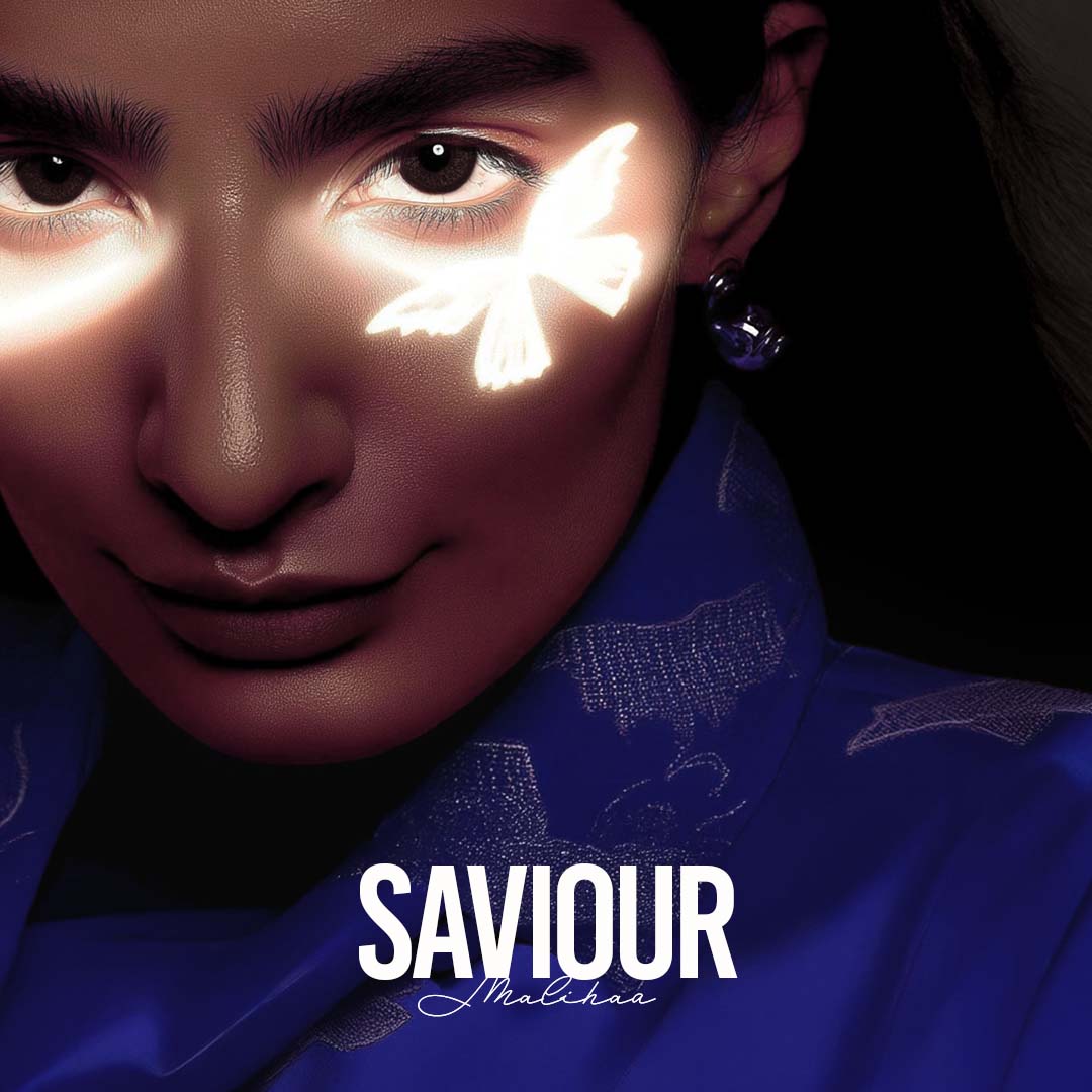 Close-up of a face with a glowing butterfly light projected on the cheek, wearing a blue garment, with the word 'SAVIOUR' and signature 'Malikaa' below.