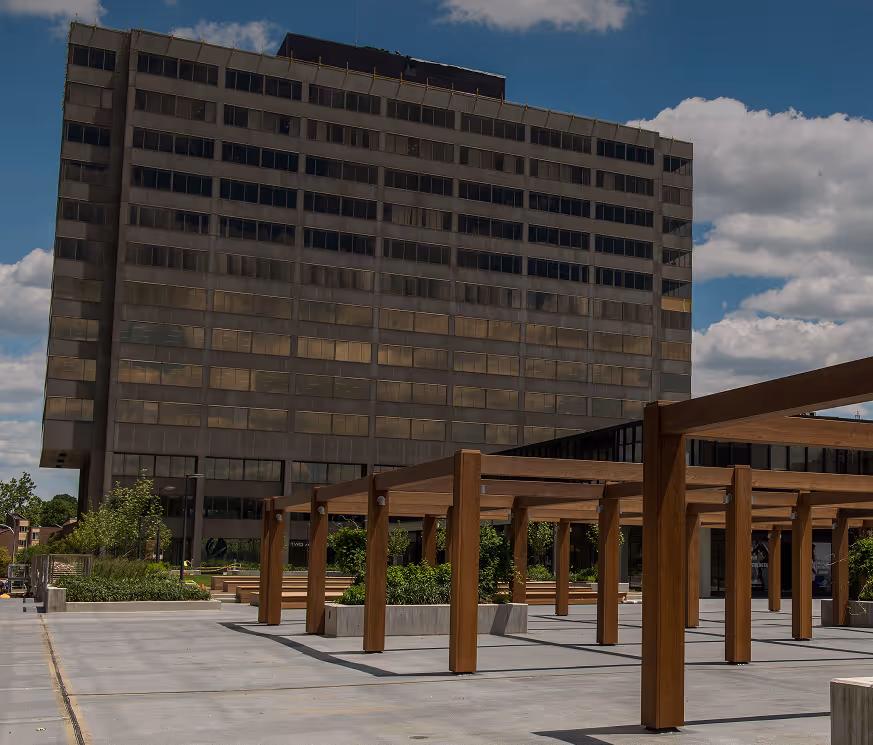 Outdoor common space by Nova Place office building on campus